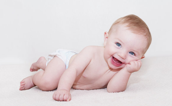 Baby Laying Down and Laughing