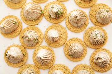 crackers with  pate and parsley