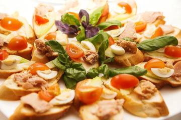 Tasty snacks with eggs, tomato and pate