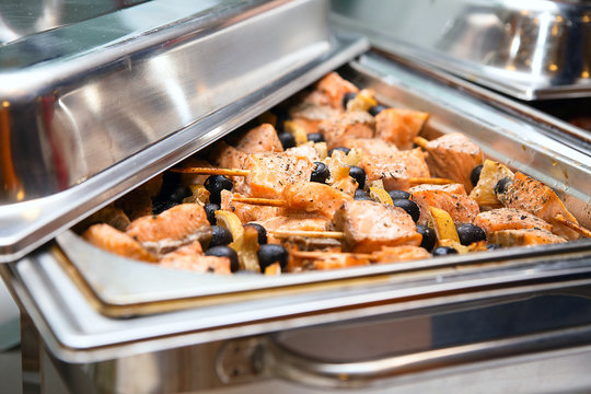 Grilled skewers of salmon