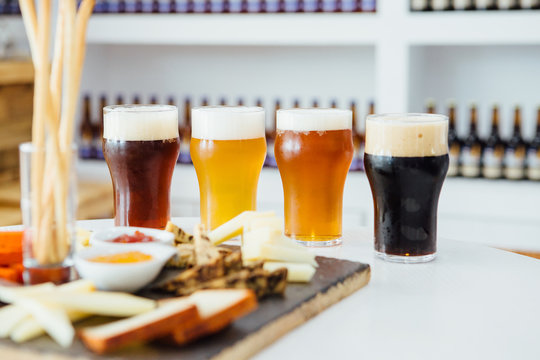 Four glasses of different craft beer