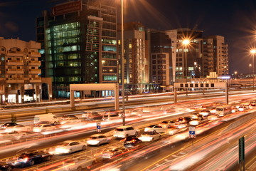 Fototapeta na wymiar Heavy traffic in Dubai-Sharjah road, Al Ittihad road in rush hour, Dubai, United Arab Emirates