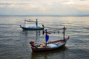 Small fishing boats in the sea Hua Hin , Thailand