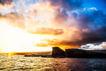 Fototapeta na wymiar Sunset. Lanai, Hawaii. Sweetheart rock. Puu Pehe. Two Rocks.