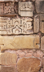Stone wall and human sculpture at temple, Khajuraho, India
