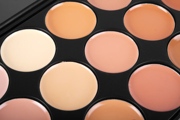 Professional makeup concealer cosmetics, close up image