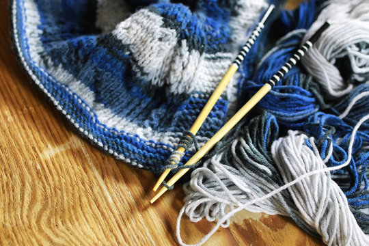 wool and knitting needles basket