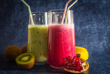 Fresh smoothie of banana, kiwi and pomegranate