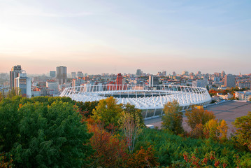 Panoramic cityscape of the centre of Kiev in the sunset: stadium, downtown, skylines, hotel. Ukraine. East Europe
