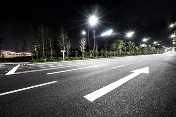 empty asphalt road in suburb of seoul at night