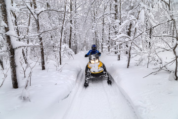 Athlete on a snowmobile