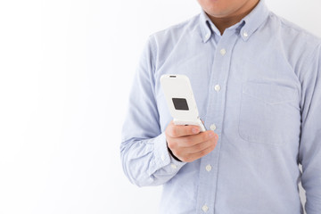 男性　ガラケー