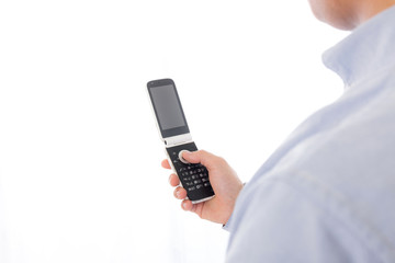 男性　ガラケー