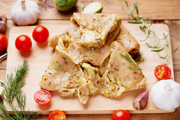 Raw marinated pork meat and vegetables 