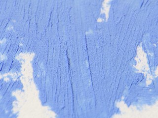 Thick acrylic paint smeared on the wall. Interior material design.