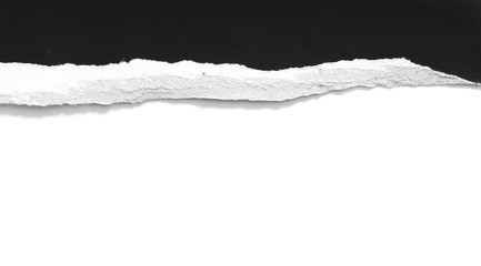 black ripped paper on white