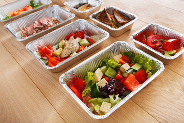 Healthy food in boxes, diet concept.
