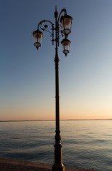 Obraz premium Beautiful sunset at Garda lake in Italy
