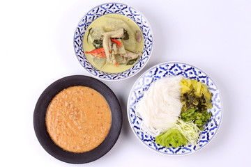 Rice noodle , green chicken curry and fish curry in coconut-milk