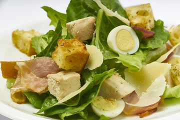 Caesar salad with quail eggs