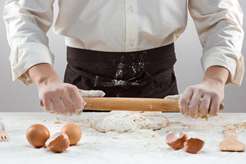 Hands kneading a dough