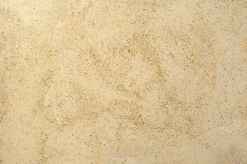 mottled decorative stucco with stone structure