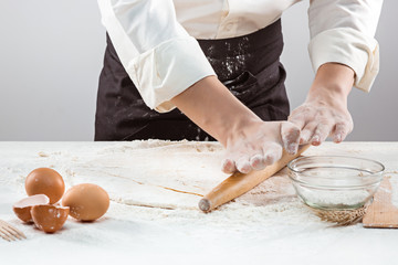 Hands kneading a dough