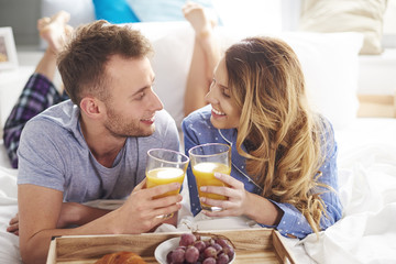 Couple having healthy food on breakfast .
