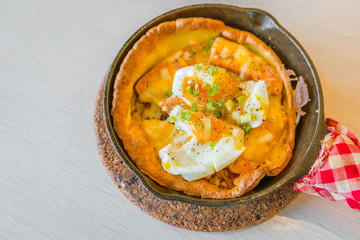 Hot Pizza with egg for breakfast .