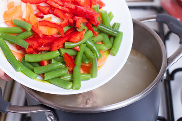 Cooking the vegetables in the soup
