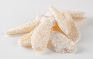 preserved fruits or dry ginger on the background.