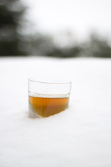 Whiskey Glass on the Snow