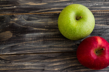 Apples on a wooden background in rustic style