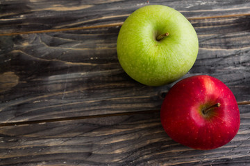 Apples on a wooden background in rustic style