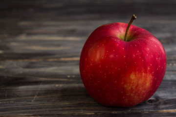 Apples on a wooden background in rustic style