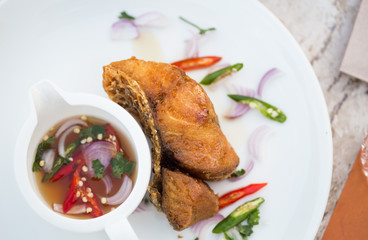 Fried Snapper fish with spicy sauce