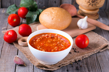 Fresh tomato soup in a white bowl
