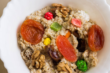 Oatmeal with dried fruit and nuts. Dietary food.