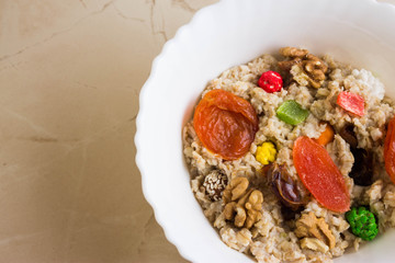 Oatmeal with dried fruit and nuts. Dietary food.