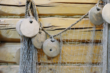  old net on the wall of the hut