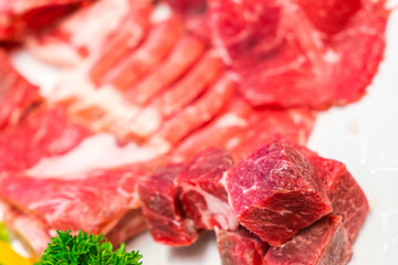 Uncooked raw fresh beef .