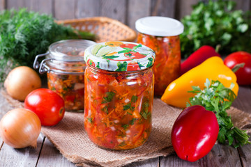 Canned vegetable salad in a glass jar