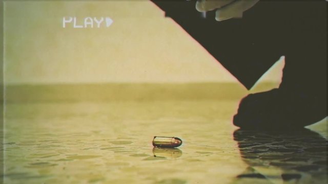 VHS retro fake shot: an investigator on a crime scene collecting a bullet from the floor with pliers and storing it in a plastic bag.
