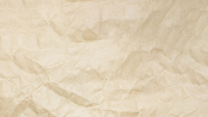 Recycled crumpled brown paper texture, paper background for design with copy space for text or image.