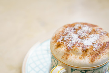Latte Coffee art on the wooden table
