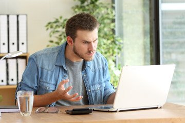 Angry freelance with a laptop