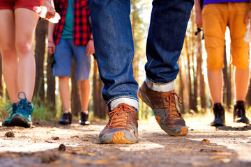 Young tourists in the woods