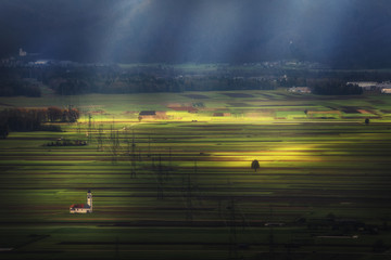 Stunning landscape with magic light and Church in Slovenia