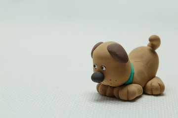 Toy a dog from plasticine