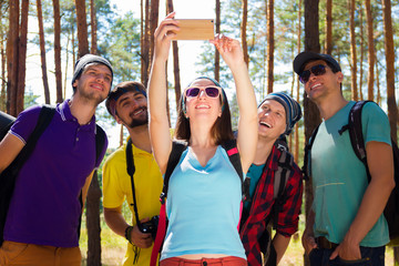 Young tourists in the woods